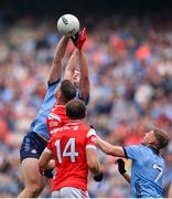 12 May 2024; Brian Fenton of Dublin in action against Conall Mc Keever of Louth during the Leinster GAA Football Senior Championship final match between Dublin and Louth at Croke Park in Dublin. Photo by Ben McShane/Sportsfile