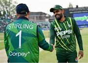 12 May 2024; Pakistan captain Babar Azam and Ireland captain Paul Stirling before match two of the Floki Men's T20 International Series between Ireland and Pakistan at Castle Avenue Cricket Ground in Dublin. Photo by Seb Daly/Sportsfile