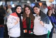 12 May 2024; Palestine players, from left, Dina Abdeen, Laila Houshan and Charlotte Phillips on arrival at Dublin Airport as the Palestine women's national football team arrive in Ireland for an International Solidarity Match against Bohemians to be played on Wednesday at Dalymount Park in Dublin. Photo by Stephen McCarthy/Sportsfile