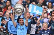 12 May 2024; Dublin captain James McCarthy lifts the cup after the Leinster GAA Football Senior Championship final match between Dublin and Louth at Croke Park in Dublin. Photo by Ben McShane/Sportsfile