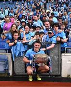 12 May 2024; Brian Howard of Dublin with the cup and supporters after the Leinster GAA Football Senior Championship final match between Dublin and Louth at Croke Park in Dublin. Photo by Ben McShane/Sportsfile