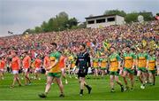 12 May 2024; Donegal captain Patrick McBrearty leads the parade before the Ulster GAA Football Senior Championship final match between Armagh and Donegal at St Tiernach's Park in Clones, Monaghan. Photo by Ramsey Cardy/Sportsfile