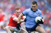 12 May 2024; Con O'Callaghan of Dublin is tackled by Donal Mc Kenny of Louth during the Leinster GAA Football Senior Championship final match between Dublin and Louth at Croke Park in Dublin. Photo by Shauna Clinton/Sportsfile