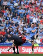 12 May 2024; Con O'Callaghan  of Dublin scores a point depsite the efforts of Craig Lennon of Louth during the Leinster GAA Football Senior Championship final match between Dublin and Louth at Croke Park in Dublin. Photo by Shauna Clinton/Sportsfile