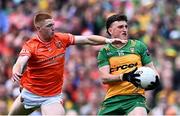 12 May 2024; Niall O'Donnell of Donegal in action against Ciarán Mackin of Armagh during the Ulster GAA Football Senior Championship final match between Armagh and Donegal at St Tiernach's Park in Clones, Monaghan. Photo by Piaras Ó Mídheach/Sportsfile