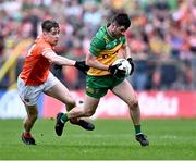 12 May 2024; Ryan McHugh of Donegal in action against Andrew Murnin of Armagh during the Ulster GAA Football Senior Championship final match between Armagh and Donegal at St Tiernach's Park in Clones, Monaghan. Photo by Piaras Ó Mídheach/Sportsfile