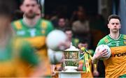 12 May 2024; Donegal players run past the Anglo Celt cup before the Ulster GAA Football Senior Championship final match between Armagh and Donegal at St Tiernach's Park in Clones, Monaghan. Photo by Piaras Ó Mídheach/Sportsfile