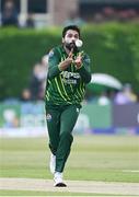 12 May 2024; Mohammad Amir of Pakistan takes the wicket of Ireland's Curtis Campher, caught and bowled, during match two of the Floki Men's T20 International Series between Ireland and Pakistan at Castle Avenue Cricket Ground in Dublin. Photo by Seb Daly/Sportsfile