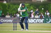 12 May 2024; Lorcan Tucker of Ireland plays a shot to bring up his half-century during match two of the Floki Men's T20 International Series between Ireland and Pakistan at Castle Avenue Cricket Ground in Dublin. Photo by Seb Daly/Sportsfile