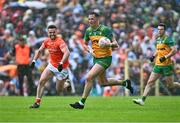 12 May 2024; Jason McGee of Donegal in action against Aidan Forker of Armagh during the Ulster GAA Football Senior Championship final match between Armagh and Donegal at St Tiernach's Park in Clones, Monaghan. Photo by Piaras Ó Mídheach/Sportsfile