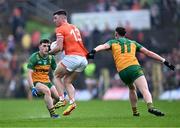 12 May 2024; Oisin Conaty of Armagh in action against Shane O'Donnell, left, and Ciaran Thompson of Donegal during the Ulster GAA Football Senior Championship final match between Armagh and Donegal at St Tiernach's Park in Clones, Monaghan. Photo by Piaras Ó Mídheach/Sportsfile