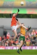 12 May 2024; Andrew Murnin of Armagh in action against Ryan McHugh of Donegal during the Ulster GAA Football Senior Championship final match between Armagh and Donegal at St Tiernach's Park in Clones, Monaghan. Photo by Ramsey Cardy/Sportsfile