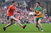 12 May 2024; Niall O'Donnell of Donegal in action against Andrew Murnin of Armagh during the Ulster GAA Football Senior Championship final match between Armagh and Donegal at St Tiernach's Park in Clones, Monaghan. Photo by Piaras Ó Mídheach/Sportsfile