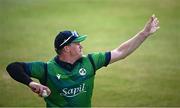 12 May 2024; Graham Hume of Ireland fields the ball during match two of the Floki Men's T20 International Series between Ireland and Pakistan at Castle Avenue Cricket Ground in Dublin. Photo by Seb Daly/Sportsfile