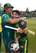 12 May 2024; Pakistan head coach Azhar Mahmood, left, and Mohammad Rizwan after their side's victory during match two of the Floki Men's T20 International Series between Ireland and Pakistan at Castle Avenue Cricket Ground in Dublin. Photo by Seb Daly/Sportsfile