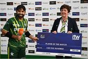 12 May 2024; Mohammad Rizwan of Pakistan is presented with the Player of the Match award by Cricket Ireland president Stella Downes after match two of the Floki Men's T20 International Series between Ireland and Pakistan at Castle Avenue Cricket Ground in Dublin. Photo by Seb Daly/Sportsfile