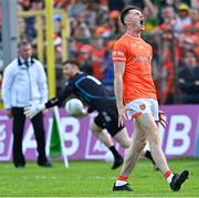 12 May 2024; Shane McPartlan of Armagh reacts after his penalty was saved by Donegal goalkeeper Shaun Patton, behind, for the last penalty in the penalty shoot-out of the Ulster GAA Football Senior Championship final match between Armagh and Donegal at St Tiernach's Park in Clones, Monaghan. Photo by Piaras Ó Mídheach/Sportsfile