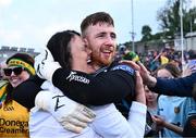 12 May 2024; Donegal goalkeeper Shaun Patton celebrates with supporter Geraldine Gallagher, after saving the final penalty, from Shane McPartlan of Armagh, in the penalty shoot-out of the Ulster GAA Football Senior Championship final match between Armagh and Donegal at St Tiernach's Park in Clones, Monaghan. Photo by Piaras Ó Mídheach/Sportsfile