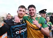 12 May 2024; Donegal players Shaun Patton, left, and Brendan McCole celebrate after their side's victory in the penalty shoot-out of the Ulster GAA Football Senior Championship final match between Armagh and Donegal at St Tiernach's Park in Clones, Monaghan. Photo by Piaras Ó Mídheach/Sportsfile