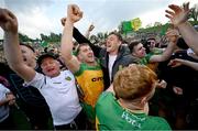 12 May 2024; Donegal players celebrate after the Ulster GAA Football Senior Championship final match between Armagh and Donegal at St Tiernach's Park in Clones, Monaghan. Photo by Ramsey Cardy/Sportsfile