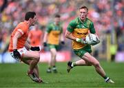 12 May 2024; Oisin Gallen of Donegal in action against Paddy Burns of Armagh during the Ulster GAA Football Senior Championship final match between Armagh and Donegal at St Tiernach's Park in Clones, Monaghan. Photo by Piaras Ó Mídheach/Sportsfile