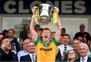 12 May 2024; Oisin Gallen of Donegal lifts the Anglo Celt Cup the Ulster GAA Football Senior Championship final match between Armagh and Donegal at St Tiernach's Park in Clones, Monaghan. Photo by Ramsey Cardy/Sportsfile