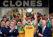 12 May 2024; Jamie Brennan of Donegal lifts the Anglo Celt Cup the Ulster GAA Football Senior Championship final match between Armagh and Donegal at St Tiernach's Park in Clones, Monaghan. Photo by Ramsey Cardy/Sportsfile