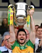 12 May 2024; Ryan McHugh of Donegal lifts the Anglo Celt Cup the Ulster GAA Football Senior Championship final match between Armagh and Donegal at St Tiernach's Park in Clones, Monaghan. Photo by Ramsey Cardy/Sportsfile