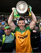 12 May 2024; Eoghán Bán Gallagher of Donegal lifts the Anglo Celt Cup the Ulster GAA Football Senior Championship final match between Armagh and Donegal at St Tiernach's Park in Clones, Monaghan. Photo by Ramsey Cardy/Sportsfile