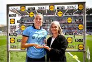 12 May 2024; Jennifer Dunne of Dublin is presented with the player of the match award by Leinster LGFA Secretary Michelle Wyse after the Leinster LGFA Senior Football Championship final match between Dublin and Meath at Croke Park in Dublin. Photo by Harry Murphy/Sportsfile