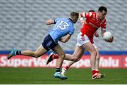 12 May 2024; Tommy Durnin of Louth in action against Paul Mannion of Dublin during the Leinster GAA Football Senior Championship final match between Dublin and Louth at Croke Park in Dublin. Photo by Shauna Clinton/Sportsfile