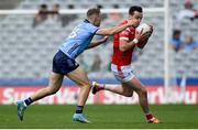 12 May 2024; Tommy Durnin of Louth is tackled by Paul Mannion of Dublin during the Leinster GAA Football Senior Championship final match between Dublin and Louth at Croke Park in Dublin. Photo by Shauna Clinton/Sportsfile