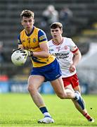 11 May 2024; Conor Ryan of Roscommon in action against Ódhrán Brolly of Tyrone  during the EirGrid GAA All-Ireland Football U20 Championship semi-final match between Roscommon and Tyrone at Kingspan Breffni in Cavan. Photo by Sam Barnes/Sportsfile