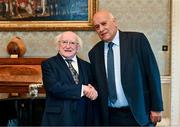 13 May 2024; The President of Ireland Michael D Higgins with Jibril Rajoub, president of the Palestinian Football Association and chair of the Palestinian Olympic Committee, during a courtesy call with representatives of the Palestinian Football Association and Bohemian Football Club at Áras an Uachtaráin in Dublin. Palestine women's national football team are in Ireland for an International Solidarity Match against Bohemians women's team to be played on Wednesday, May 15, at Dalymount Park in Dublin. Photo by Stephen McCarthy/Sportsfile