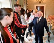 13 May 2024; The President of Ireland Michael D Higgins with Bohemians manager Ken Kiernan during a courtesy call with representatives of the Palestinian Football Association and Bohemian Football Club at Áras an Uachtaráin in Dublin. Palestine women's national football team are in Ireland for an International Solidarity Match against Bohemians women's team to be played on Wednesday, May 15, at Dalymount Park in Dublin. Photo by Stephen McCarthy/Sportsfile