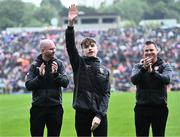 12 May 2024; Cian McGeeney representing his father Kieran McGeeney as his Armagh 1999 Ulster Football Senior Championship winning team were honoured at half-time in the Ulster GAA Football Senior Championship final match between Armagh and Donegal at St Tiernach's Park in Clones, Monaghan. Photo by Piaras Ó Mídheach/Sportsfile