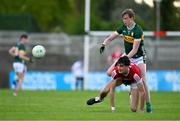 13 May 2024; Killian Dennehy of Kerry in action against Jack Trench of Cork during the Electric Ireland Munster GAA Football Minor Championship Final match between Cork and Kerry at Páirc Ui Rinn in Cork. Photo by Brendan Moran/Sportsfile