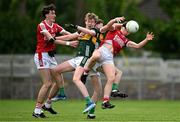 13 May 2024; Danny Miskella, right, and Cork players in action against Killian Dennehy and Fionnan Ryan of Kerry during the Electric Ireland Munster GAA Football Minor Championship Final match between Cork and Kerry at Páirc Ui Rinn in Cork. Photo by Brendan Moran/Sportsfile