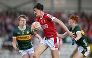 13 May 2024; Jack Trench of Cork in action against Killian Dennehy, left, and Jack Joy of Kerry during the Electric Ireland Munster GAA Football Minor Championship Final match between Cork and Kerry at Páirc Ui Rinn in Cork. Photo by Brendan Moran/Sportsfile