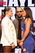13 May 2024; Katie Taylor, left, and Amanda Serrano face off in the company of Most Valuable Promotions co-founder Nakisa Bidarian during a pre-fight press conference held at the Apollo Theatre in New York, USA, in advance of Jake Paul and Mike Tyson's heavyweight bout and the rematch between Katie Taylor and Amanda Serrano for the undisputed super lightweight championship titles on July 20 at AT&T Stadium in Arlington, Texas. Photo by Ed Mulholland / Sportsfile