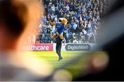 11 May 2024; Leinster mascot Leo the Lion with Mike McCarthy before the United Rugby Championship match between Leinster and Ospreys at the RDS Arena in Dublin. Photo by Ramsey Cardy/Sportsfile