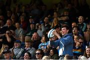 11 May 2024; A supporter catches the match ball during the United Rugby Championship match between Leinster and Ospreys at the RDS Arena in Dublin. Photo by Ramsey Cardy/Sportsfile