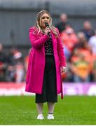 12 May 2024; Katie Boyle from Aghabog GFC sings the national anthem before the Ulster GAA Football Senior Championship final match between Armagh and Donegal at St Tiernach's Park in Clones, Monaghan. Photo by Ramsey Cardy/Sportsfile