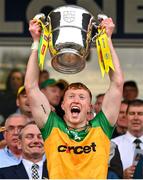 12 May 2024; Oisin Gallen of Donegal lifts the Anglo Celt Cup after the Ulster GAA Football Senior Championship final match between Armagh and Donegal at St Tiernach's Park in Clones, Monaghan. Photo by Ramsey Cardy/Sportsfile