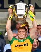 12 May 2024; Ciaran Moore of Donegal lifts the Anglo Celt Cup after the Ulster GAA Football Senior Championship final match between Armagh and Donegal at St Tiernach's Park in Clones, Monaghan. Photo by Ramsey Cardy/Sportsfile
