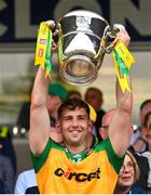 12 May 2024; Charles McGuinness of Donegal lifts the Anglo Celt Cup after the Ulster GAA Football Senior Championship final match between Armagh and Donegal at St Tiernach's Park in Clones, Monaghan. Photo by Ramsey Cardy/Sportsfile