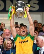 12 May 2024; Michael Langan of Donegal lifts the Anglo Celt Cup after the Ulster GAA Football Senior Championship final match between Armagh and Donegal at St Tiernach's Park in Clones, Monaghan. Photo by Ramsey Cardy/Sportsfile