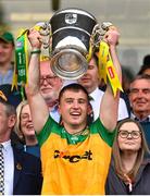 12 May 2024; Peadar Mogan of Donegal lifts the Anglo Celt Cup after the Ulster GAA Football Senior Championship final match between Armagh and Donegal at St Tiernach's Park in Clones, Monaghan. Photo by Ramsey Cardy/Sportsfile