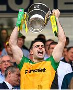 12 May 2024; Caolan McGonagle of Donegal lifts the Anglo Celt Cup the Ulster GAA Football Senior Championship final match between Armagh and Donegal at St Tiernach's Park in Clones, Monaghan. Photo by Ramsey Cardy/Sportsfile