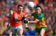 12 May 2024; Oisin O'Neill of Armagh in action against Aaron Doherty of Donegal during the Ulster GAA Football Senior Championship final match between Armagh and Donegal at St Tiernach's Park in Clones, Monaghan. Photo by Ramsey Cardy/Sportsfile